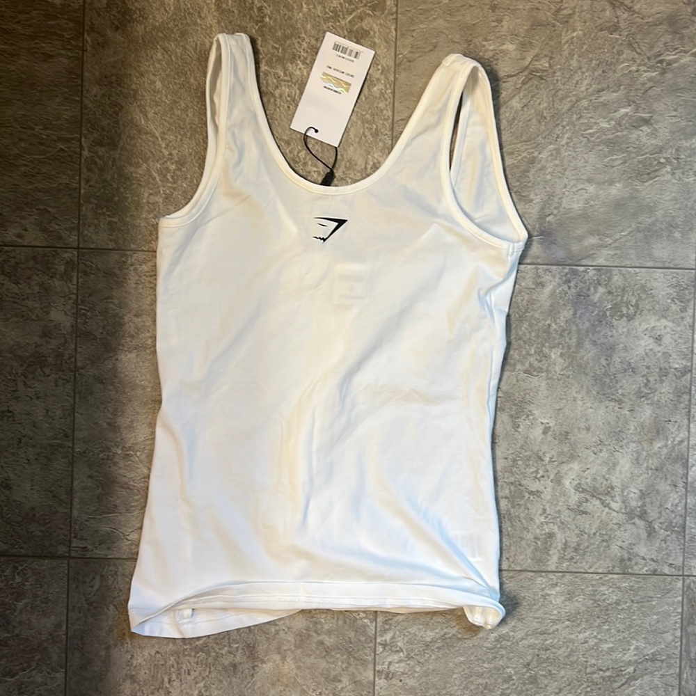 Tank top with tag still on